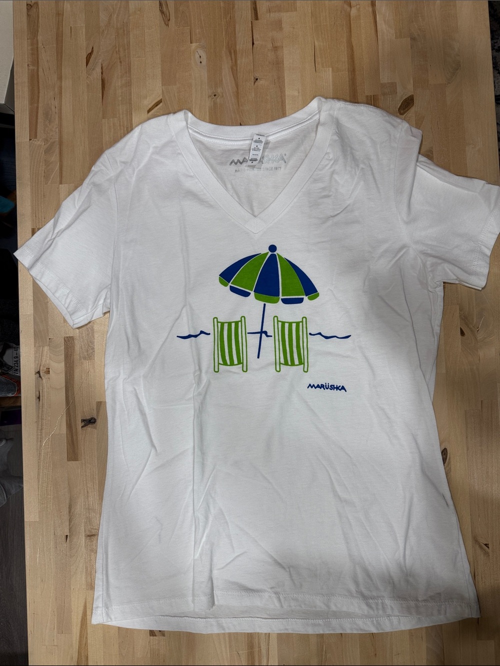 Marushka White V-Neck Tee with Blue & Green Beach Graphic